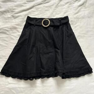 Axes Femme emerald green lace trim high waisted mini skirt with gold belt buckle
